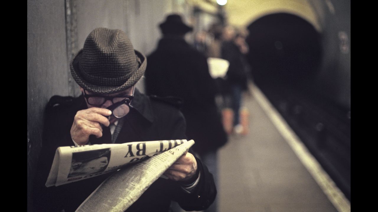 In this image, also from the mid '80s, a man reads the newspaper with two pairs of glasses. "Lots of people think it's a magnifying glass," Mazzer writes in his book, Bob Mazzer Underground. "But it is another pair of spectacles."