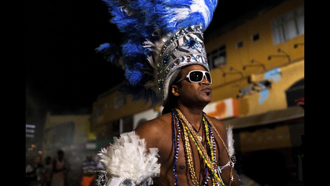 Well-known Bahia musician Carlinhos Brown dances before Salvador's festival of Yemanjá, the goddess of the sea. Yemanjá is one of the most popular orixás, the deities from the Afro-Brazilian religion of Candomblé. 