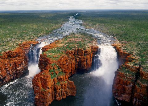 Tours to Australia's far north Kimberley region include breath taking terracotta-colored landscapes, and the thundering King George Falls.