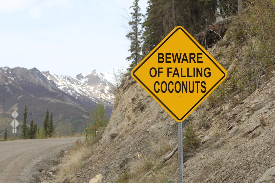 A warning about tropical hazards is the first sign that makes drivers heading up the hill think, "Huh?"