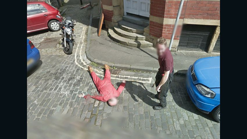 Gary Kerr stands over Dan Thompson in this Google Street View image snapped in 2012.