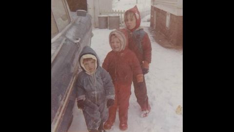 This wintry scene in Ballwin, Missouri, in 1967, came from <a href="http://ireport.cnn.com/docs/DOC-1137807">Carol Bock</a>, front, who said her mother would put bread bags on their feet to keep them warm. "I remember playing in the snow and throwing snowballs," she said. "I never liked it when my brothers threw the snowballs back at me." (Click the double arrows for more photos.)
