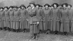 Female army recruits from the United Kingdom are seen during drills in May 1917. World War I broke down barriers between military and civilian life. With the men away in battle, women took on an extraordinary role in support of the war, whether it was on the front lines or at home in factories and farms.