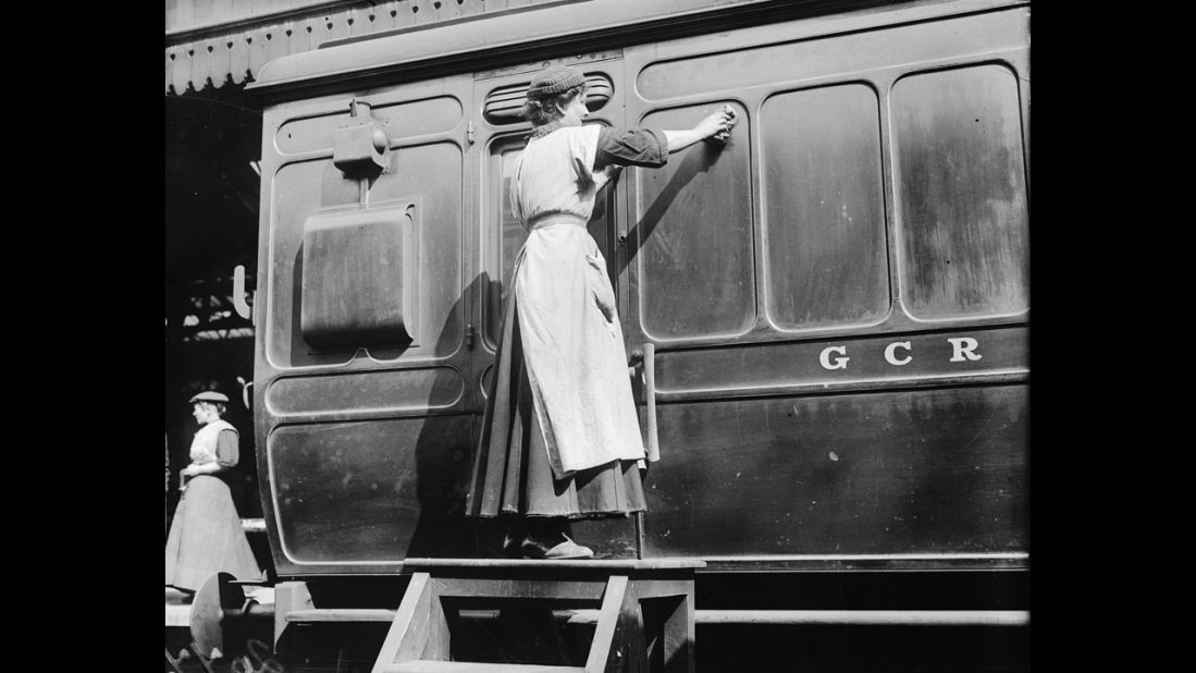 A woman works as a porter at the Marylebone station in London. British propaganda posters declaring soldiers' dependence on female munitions workers gave women a sense that their labor contributions would be important -- and acknowledged. But this was not always the case.