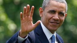 U.S. President Barack Obama waves as he returns to the White House May 28, 2014 in Washington, DC.