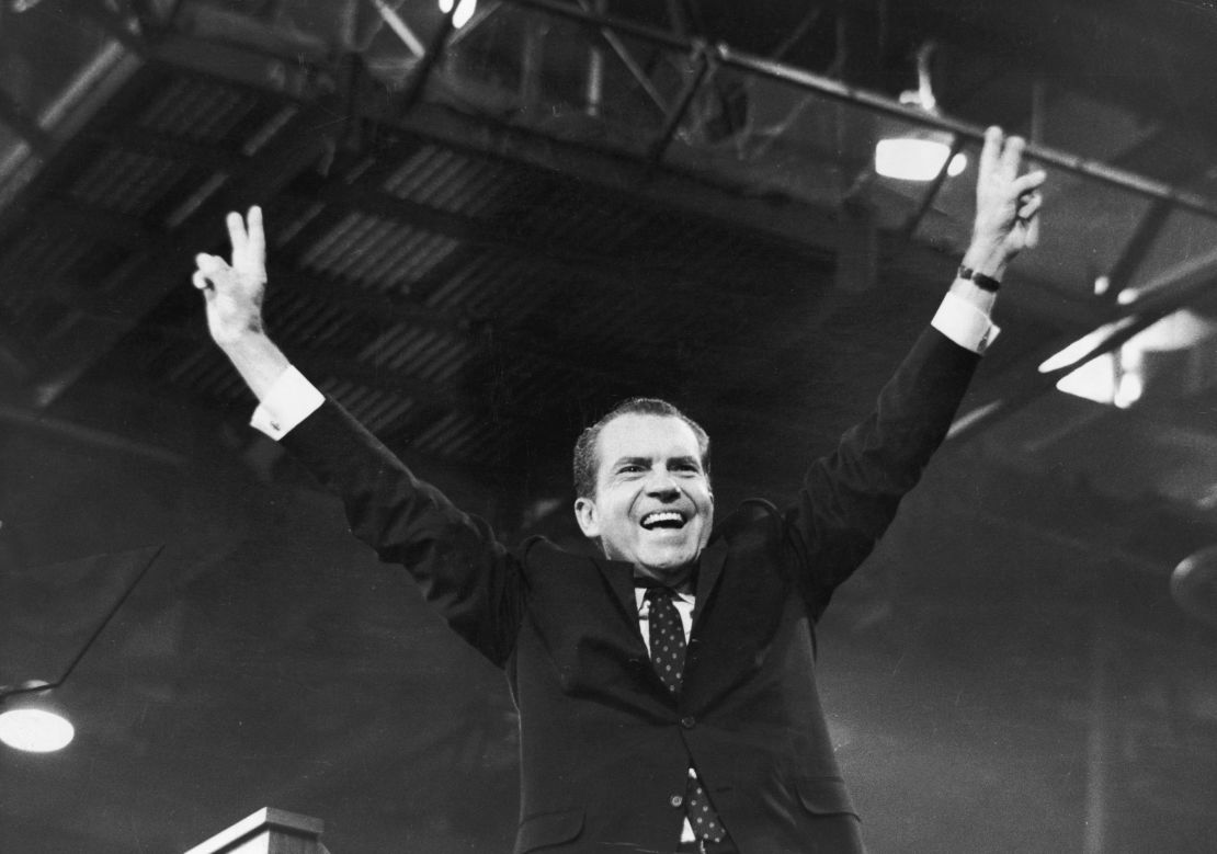 Nixon gives the victory sign after winning the presidential nomination at the GOP Convention in August, 1968.