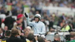 Kieren Fallon celebrates after winning The Vodafone Derby Stakes held at Epsom Racecourse on North Light on June 5, 2004 in Epsom, England. (Photo by Phil Cole/Getty Images)
