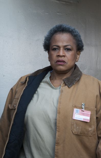 Miss Claudette Pelage (Michelle Hurst) is one of the oldest inmates at the prison. She ends up there after killing a client who abused an employee at her cleaning company. Other prisoners fear her. 