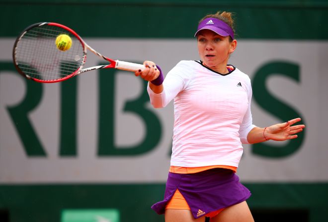 Simona Halep overcame former French Open champion Svetlana Kuznetsova 6-2 6-2 to qualify for her first ever grand slam semifinal.