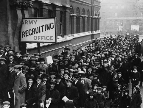 Britons stand in line outside an Army recruiting station.