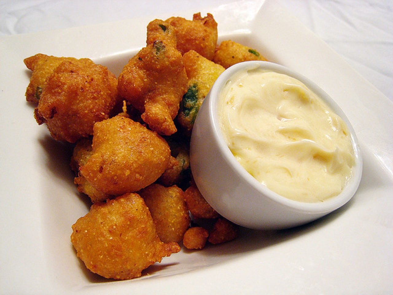 Jalapeno hush puppies are among the imaginative dishes at Dirty Candy in New York.  
