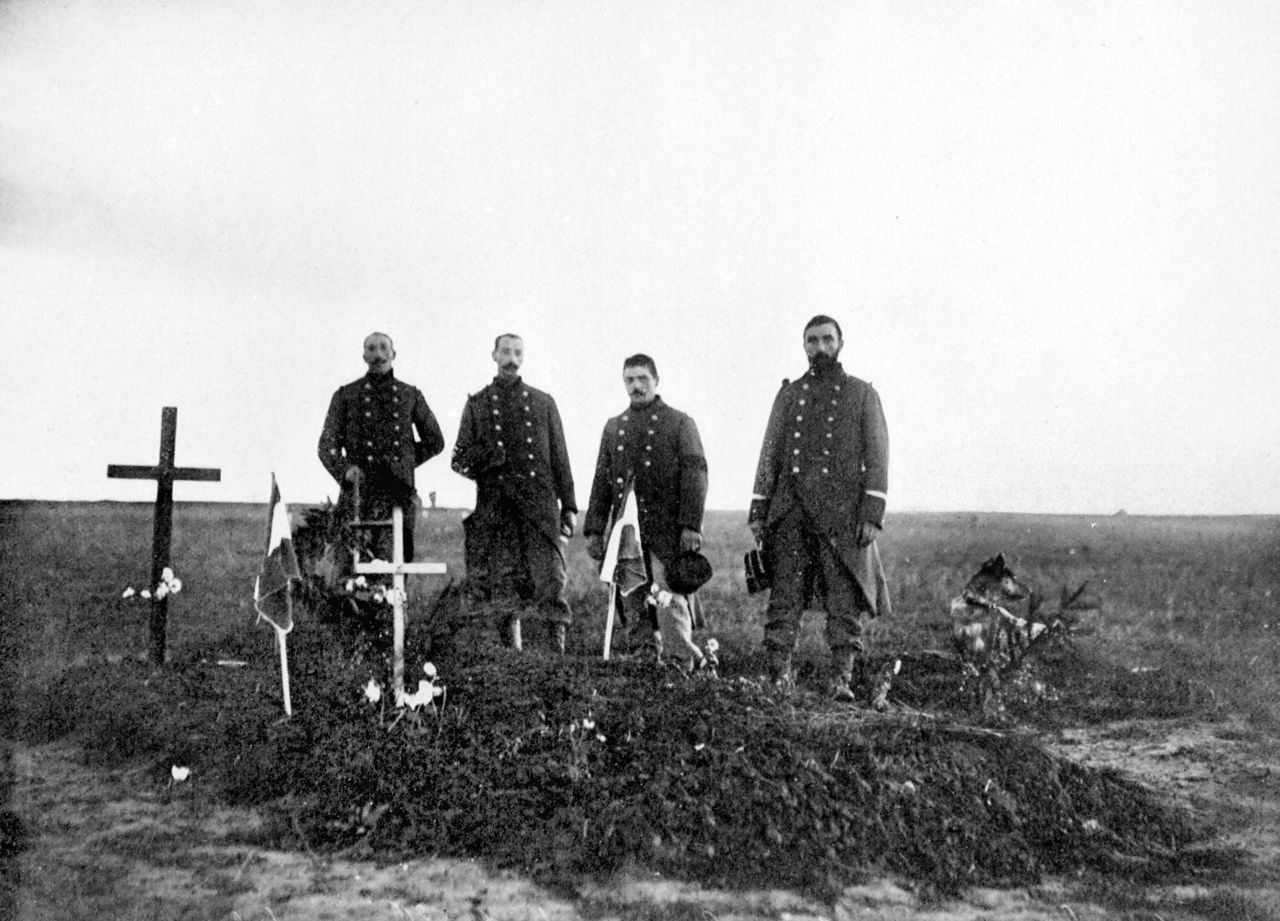 Men visit the graves of French soldiers killed in the Battle of the Marne in September 1914.