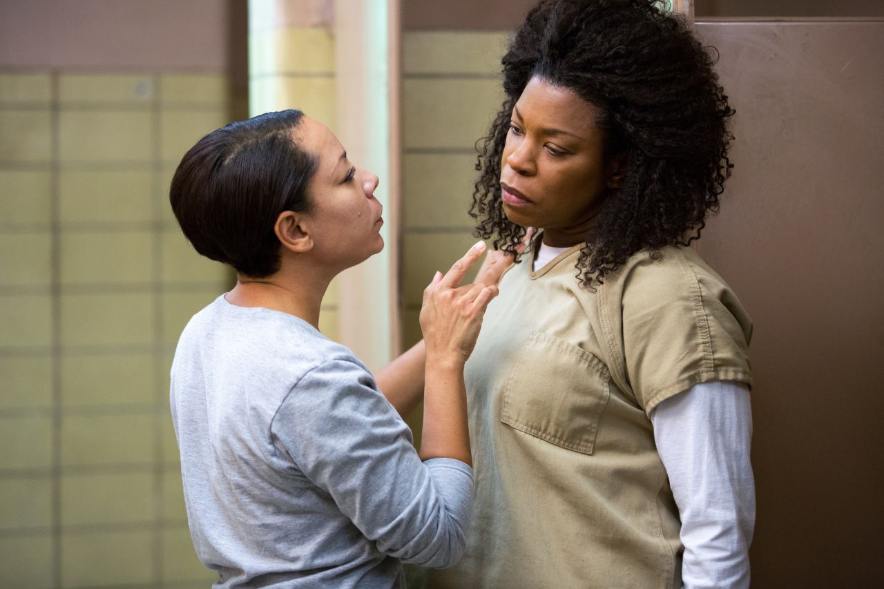 Lorraine Toussaint joined the cast in season two as Yvonne "Vee" Parker, shown here with Gloria. Former drug runner Vee clashes with the other inmates, including Red.