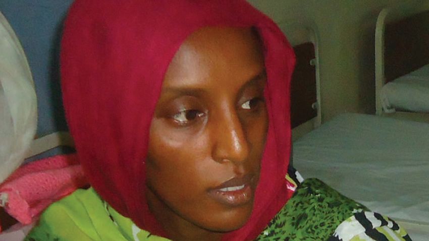 Meriam Yahia Ibrahim Ishag, a 27-year-old Christian Sudanese woman sentenced to hang for apostasy, sits in her cell a day after she gave birth to a baby girl at a women's prison in Khartoum's twin city of Omdurman on May 28, 2014.