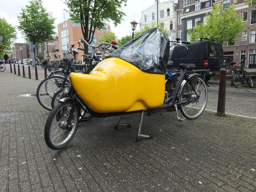 The key to definitely not blending in is renting a bicycle shaped like an uncomfortable wooden shoe. Rent this and expect scornful looks from locals and ill-concealed mirth when it accidentally gets steered into a canal.