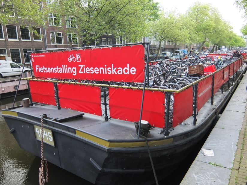 Sometimes bikes end up in a canal on purpose. One ingenious storage solution makes use of the city's waterways to accommodate a floating bike park. 