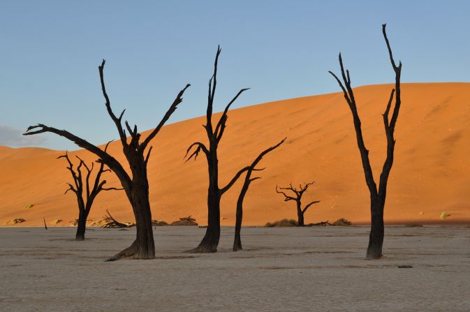 "Completely otherworldly" is how <a href="http://ireport.cnn.com/docs/DOC-1138980">Estin Yang</a> describes his visit to Sossusvlei in Namibia's<a href="http://www.namibiatourism.com.na/pages/national+parks" target="_blank" target="_blank"> Namib-Naukluft National Park</a>. He and his wife camped out at the gates two hours before sunrise to make sure they could reach the sand dunes in the perfect light. 
