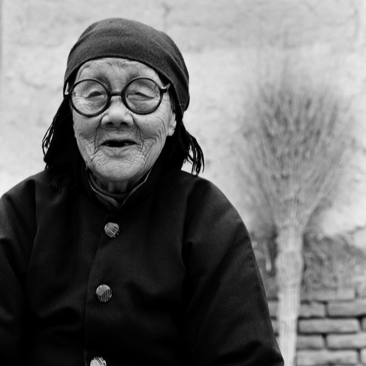 Portrait of Yang Jinge. The 91-year-old woman told Farrell: "Bound feet was a disrespect for the body, sometimes it was too painful and I couldn't go away to another village or to school. Bound feet is blind faith -- it was believed it would help us have a better marriage but when I had my feet bound it was already such an old tradition and was not a part of modern China." 