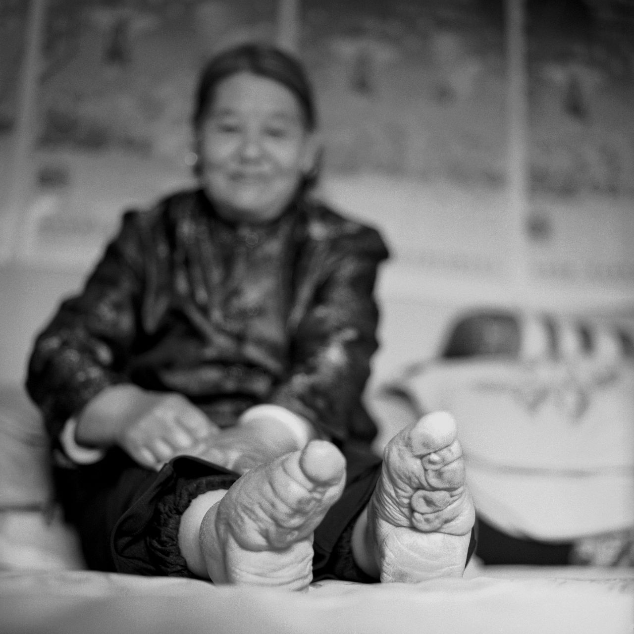 "Su Xi Rong had the most beautiful feet in her village. Her feet had the ideal shape, which not only has the toes wrapped, but also the heel compressed towards the toes to create a crevice in the arch of the foot that was considered highly erotic for the husband," says Farrell.