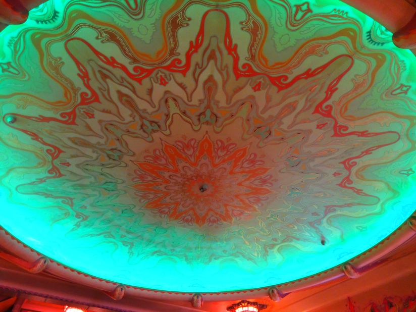 The eye-dazzling ceiling of the Tuschinski's art deco lobby is one of many opulent features in the cinema.