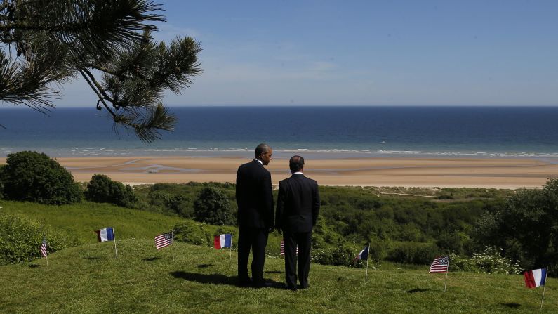 President Obama and French President Francois Hollande survey Omaha Beach on June 6.