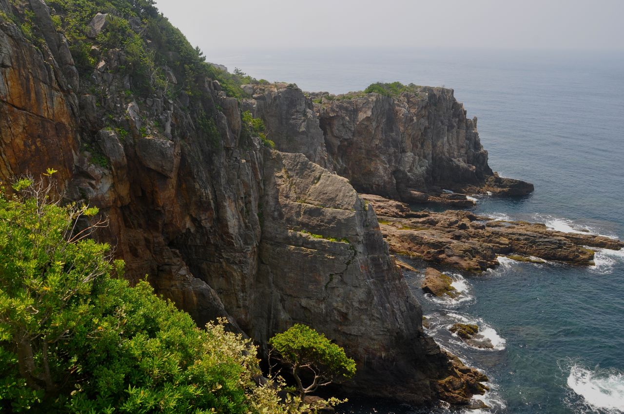 An elevator takes visitors beneath Shirahama's Sandanbeki cliffs to underground caves where the ocean rushes in. There's also a small exhibit showing how Japanese pirates once used the cliffs and caves as hiding spots.