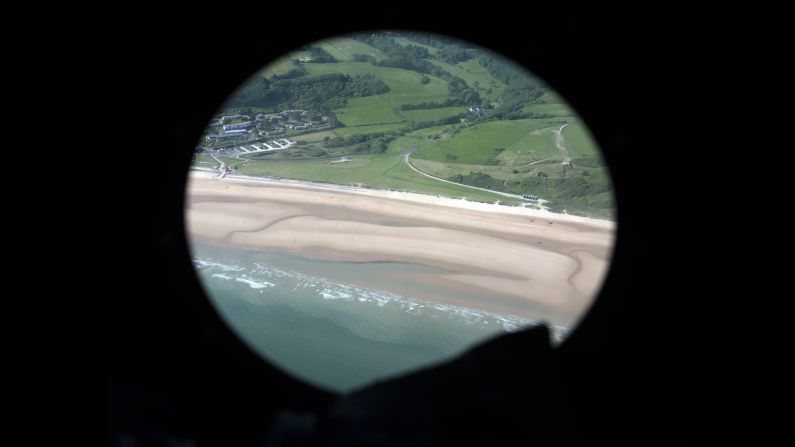 The beaches of Normandy are seen from a helicopter on June 6.