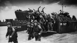 Reinforcements disembarking from a landing barge at Normandy during the Allied Invasion of France on D-Day June 6, 1944.