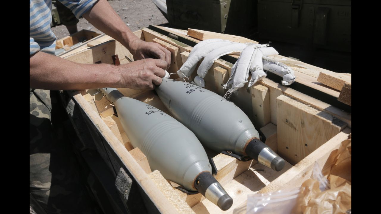 A Ukrainian soldier prepares explosives during a battle with pro-Russian separatists in Slovyansk on June 6.