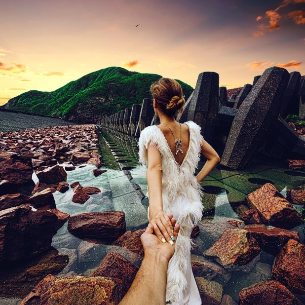 The "Follow Me To" photography project that made social media waves last year has been commissioned for a tourism campaign in Hong Kong. Here, Natalia Zakharova leads her photographer boyfriend Murad Osmann through the city's Global Geopark. 