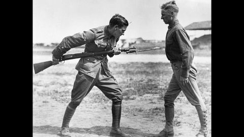 A British sergeant major instructs American soldiers in bayonet fighting at Texas' Camp Dick.