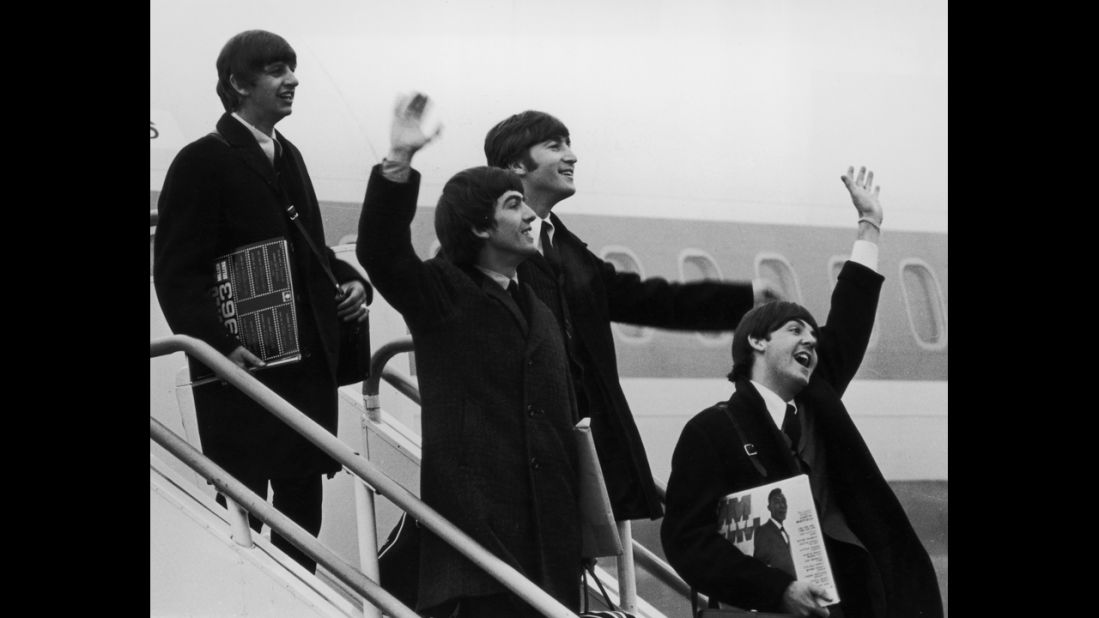 The Beatles exploded on the American scene, kicking off the British Invasion. Ringo Starr, George Harrison, John Lennon and Paul McCartney arrive at JFK airport to an overwhelming, screaming reception to start their U.S. tour in 1964. 