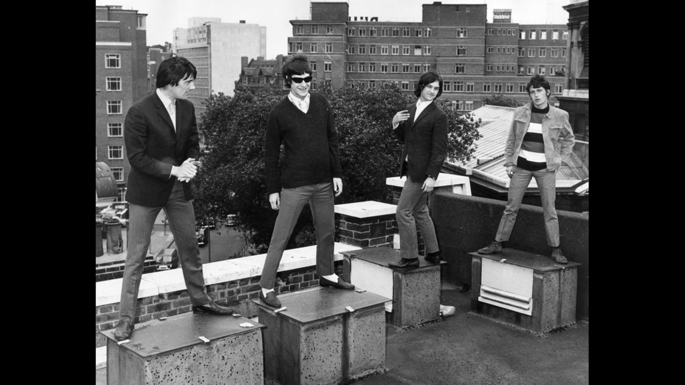Ray Davies, Dave Davies and Pete Quaife of The Kinks stand on a London rooftop. They brought a satiric and intelligent take to pop music. The band hit the U.S. with "Waterloo Sunset," "Tired of Waiting for You" and "Lola," among many other songs.
