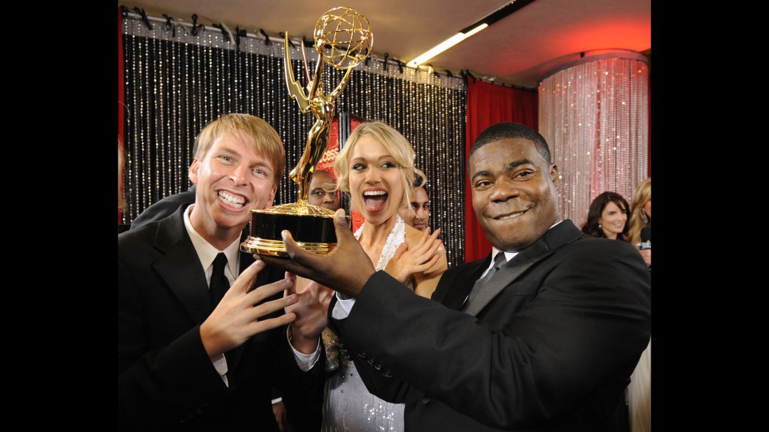 "30 Rock" cast members joke around with their award for outstanding comedy series backstage at the Emmy Awards in Los Angeles on September 21, 2008. Morgan was also nominated for outstanding supporting actor in a comedy series. 