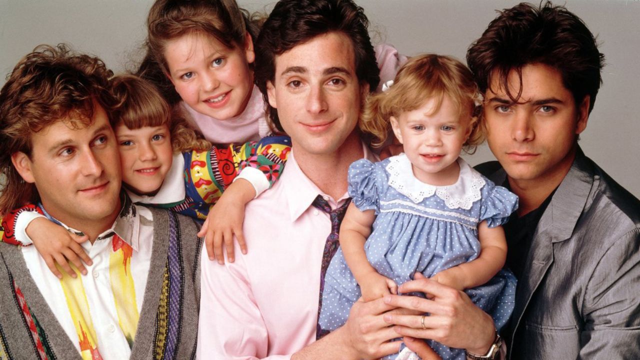<strong>"Full House":</strong> Living up to its name, viewers of the ABC series watched widower Danny Tanner (played by Bob Saget) raise his three daughters with the in-house help of childhood friend Joey Gladstone (Dave Coulier) and brother-in-law Jesse Katsopolis (John Stamos).