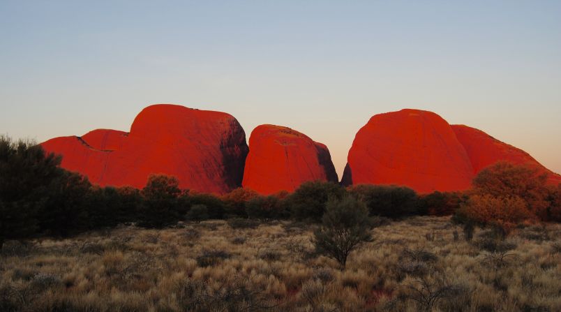 <a href="http://www.parksaustralia.gov.au/uluru/people-place/amazing-facts.html" target="_blank" target="_blank">Uluru-Kata Tjuta National Park</a> in Australia is home to one of the largest sandstone monoliths in the world. <a href="http://ireport.cnn.com/docs/DOC-1141663">Anusha Mookherjee</a> says the park feels incredibly spiritual. From her experience, the best time to visit is at sunrise or sunset. "It is extremely stunning at sunset when the rocks glow a deep, fiery red," she said.