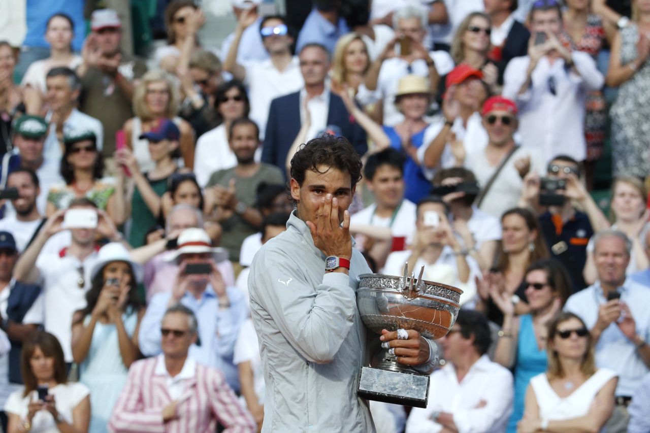 The emotion shows as Nadal gets his hands on the French Open title for an unprecedented ninth time.