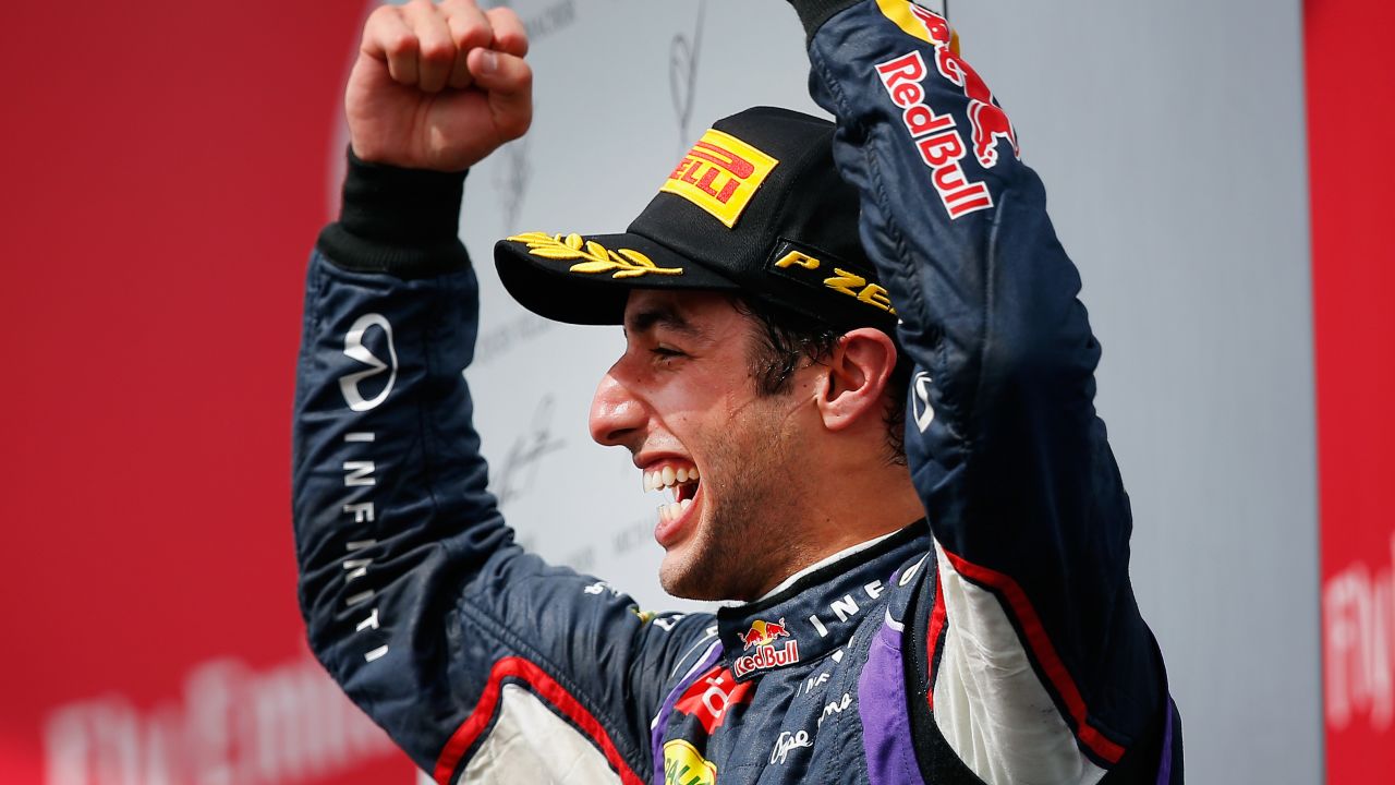 The taste of victory. Daniel Ricciardo celebrates his maiden win after taking the checkered flag in Montreal.