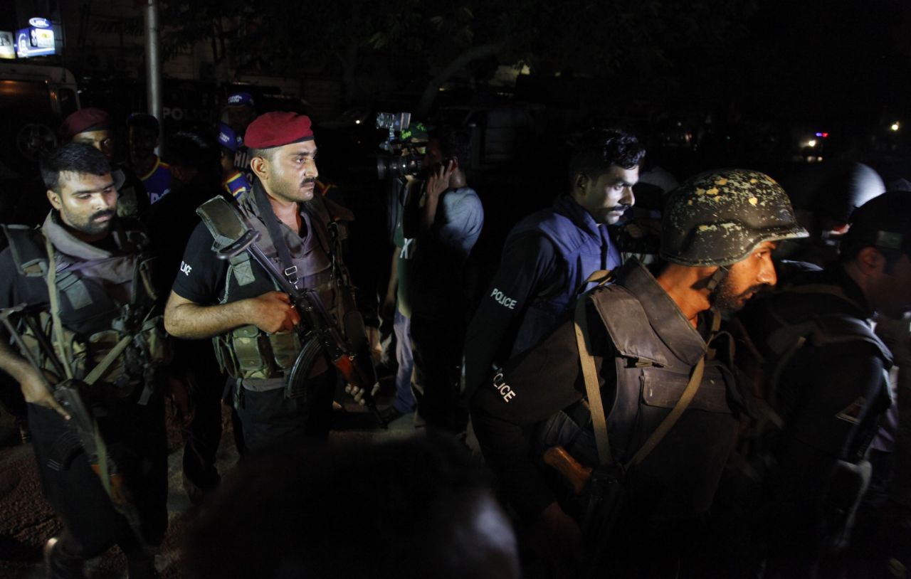 Pakistani commandos get ready to enter an airport terminal on June 8.