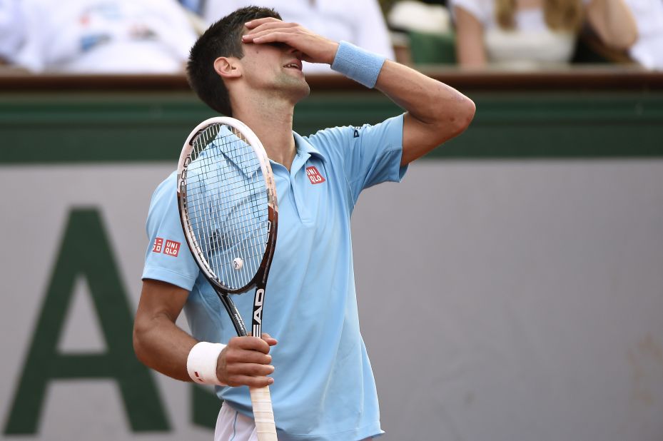 The desperation shows on Djokovic's face after his victory hopes slip away on Philippe Chatrier.