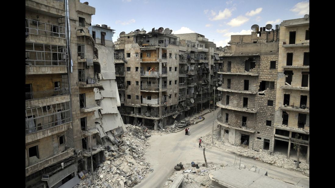 Apartments and other buildings lie in ruins on Tuesday, June 3, in <a href="http://www.cnn.com/2014/06/09/world/meast/syria-aleppo-reporters-notebook/">Aleppo, a city that "has had the life bombed out of it,"</a> according to CNN's Nick Paton Walsh.