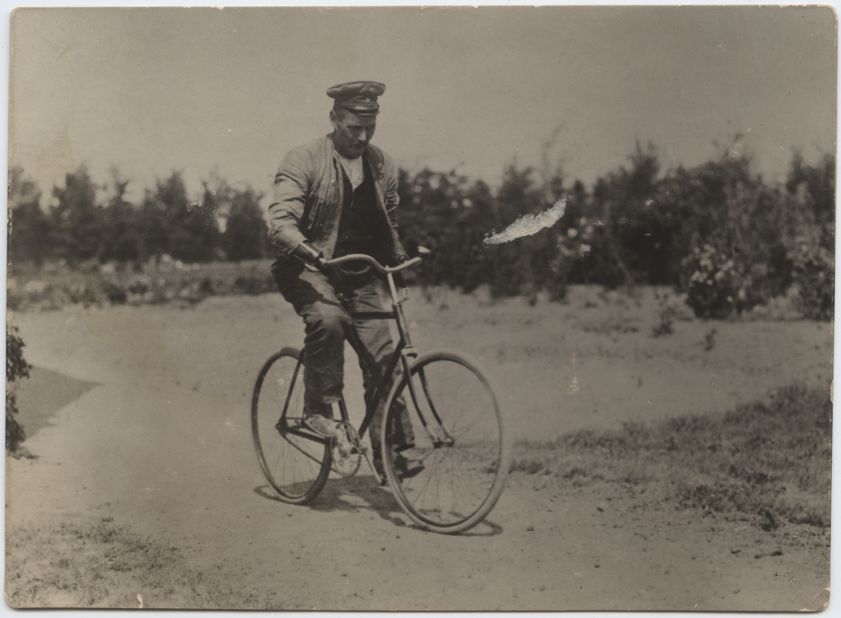 German man riding a bicycle using prostheses on both arms and legs. Photo by Dr. P. A. Smithe, American Red Cross surgeon at the Vienna Red Cross Hospital, 1914-1915.