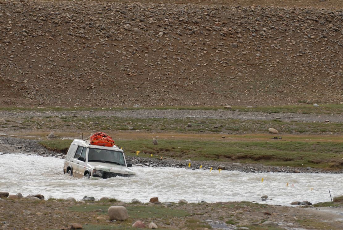 Four-wheel drive river crossing near India's frontier. 