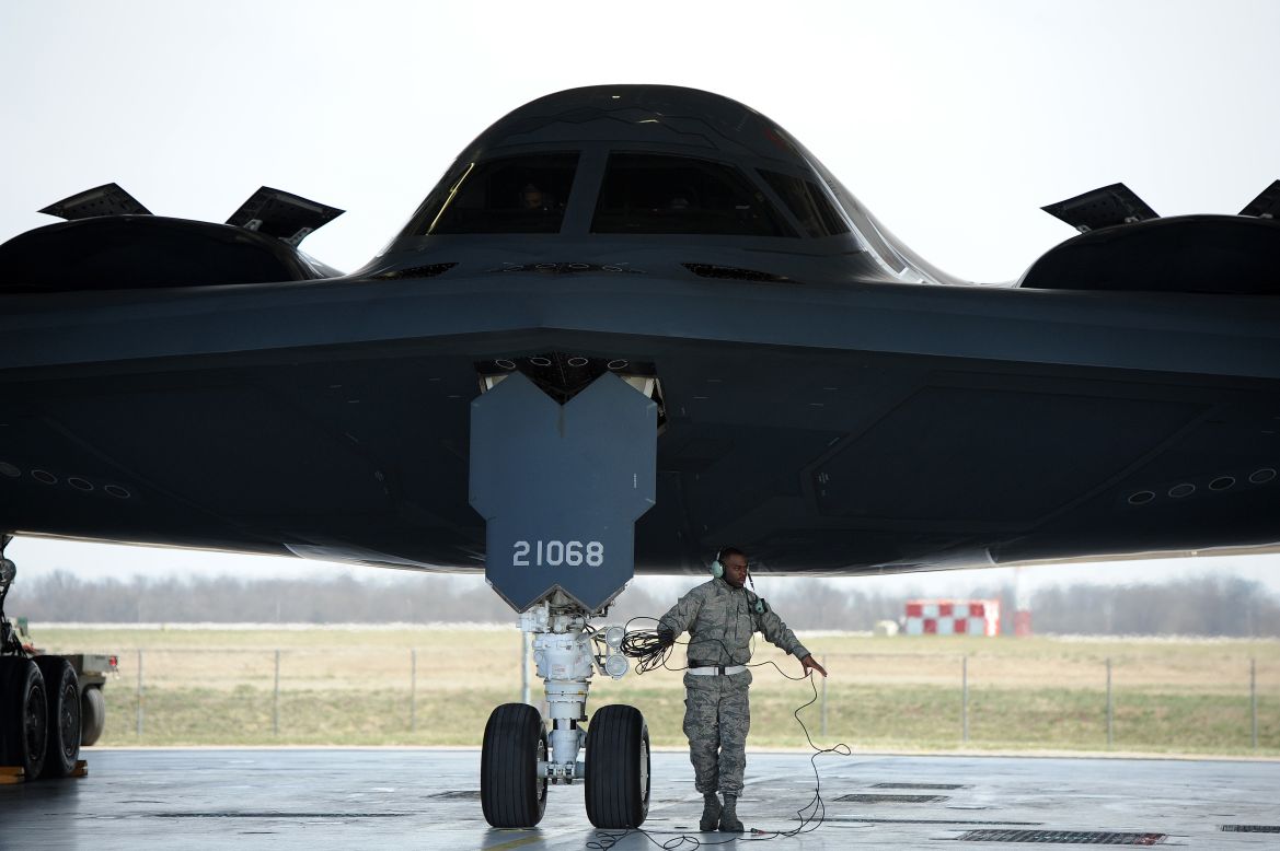 Airman 1st Class Steven McCray, a B-2 crew chief, performs pre-flight checks at Whiteman in April 2013. Each B-2 costs about $1.16 billion.