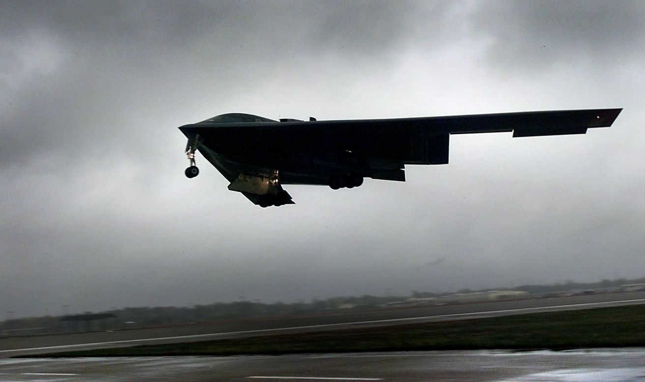 A B-2 takes off from Whiteman for a training run to Alaska in October 2002. B-2s can carry conventional or nuclear weapons. The planes have flown combat missions over Iraq, Afghanistan and Kosovo.