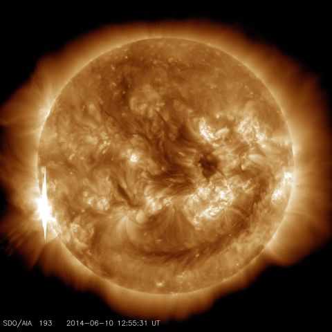 NASA shows this second flare, which appears as a bright flash on the left side of the sun, shortly after it peaked at 8:52 a.m. ET on June 10. It was less powerful than the first flare that day.