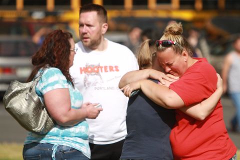 Family and friends of Reynolds High School students waited outside for word of students' safety. Details about what led to the shooting weren't immediately available.