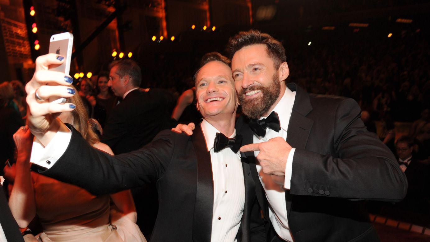 Actors Neil Patrick Harris, left, and Hugh Jackman attend the Tony Awards at New York's Radio City Music Hall on Sunday, June 8. It was Jackman's fourth time hosting the awards show, which honors the best on Broadway. Harris has also hosted the show four times.