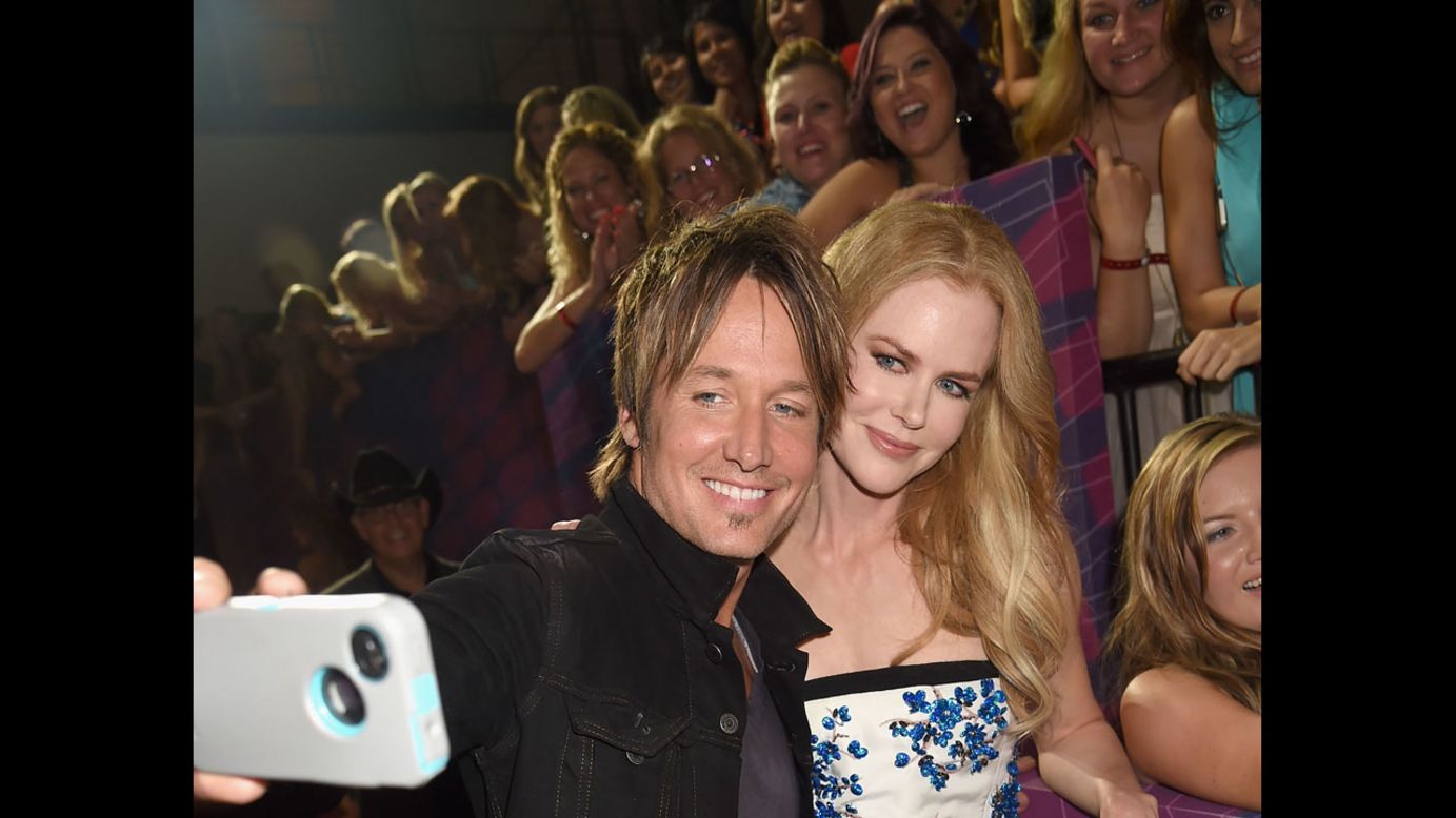 Country music singer Keith Urban and his wife, actress Nicole Kidman, arrive at the CMT Music Awards.