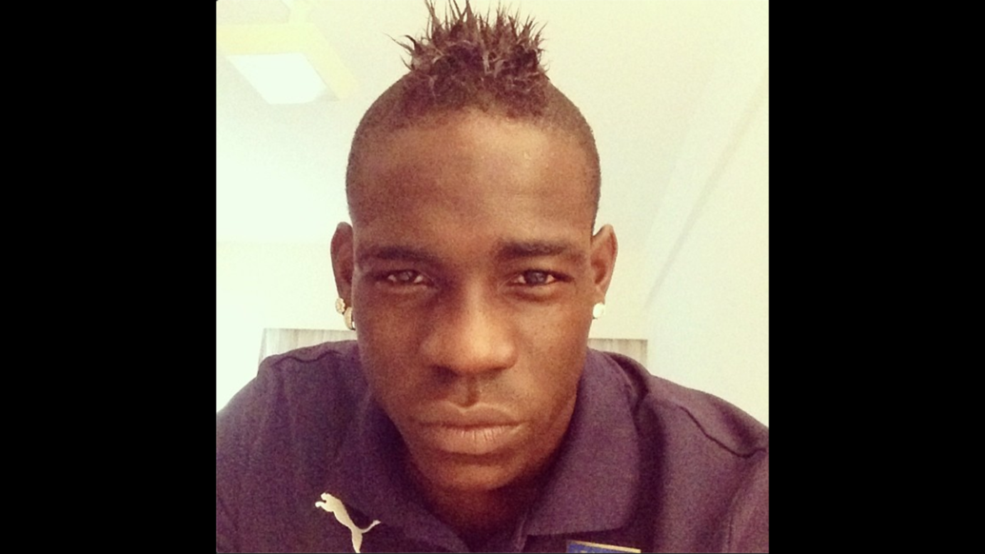 Italian soccer player Mario Balotelli shows off his latest hairstyle in this photo posted to <a href="http://instagram.com/p/o8pDJKLj8b" target="_blank" target="_blank">his Instagram account</a> Saturday, June 7. The prolific goal scorer is one of 32 players <a href="http://www.cnn.com/2014/06/06/worldsport/gallery/32-players-world-cup/index.html">we'll be keeping a close eye on</a> during the World Cup in Brazil.